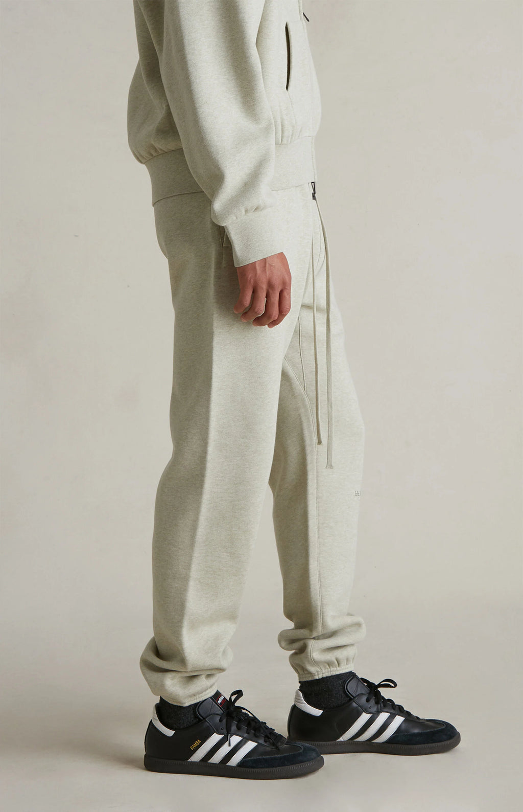 FEAR OF GOD ESSENTIALS SWEATPANTS 'HEATHER STONE' FW25