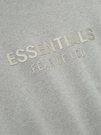 FEAR OF GOD ESSENTIALS HOODIE 'CONCRETE HEATHER' FW25